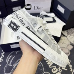 Giày Converse X Dior Kaws B23 Daniel Arsham Low Newspaper Like Auth 01